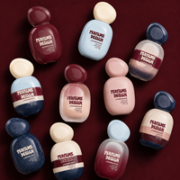 Vente en gros de flacons de parfum en verre de 50 ml, forme de galet vibrante, collection d'été, conteneur de parfum Gen Z, logo personnalisé, en vrac