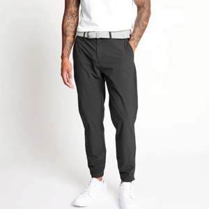 Pantalones de golf de rendimiento para hombre: tela elástica y de secado rápido, perfectos para un juego cómodo y elegante en el campo de golf - Product Image 1