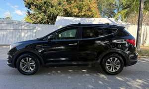 2022 para Santa Fe Sport SUV 4.1-6L FWD Volante a la Izquierda Asientos de Cuero con Interior Oscuro Neumáticos R16 - Product Image 3