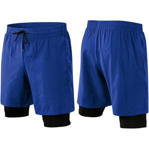 กางเกงขาสั้นออกกำลังกายผู้ชายสีพื้นผ้าสองชั้น 100% ผ้าฝ้าย สตรีทแวร์ แห้งเร็ว ระบายอากาศดี ซับในตาข่าย เป็นมิตรกับสิ่งแวดล้อม เอวยางยืด - Product Image 1