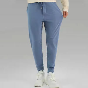 2025 Venta caliente de alta calidad de los hombres pantalones de chándal de cintura media deportes gimnasio Fitness ropa Casual con bolsillos laterales para entrenamiento - Product Image 1