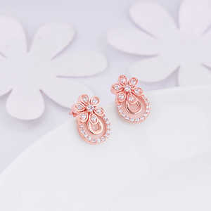 Boucles d'oreilles en or rose avec arc floral - Product Image 1