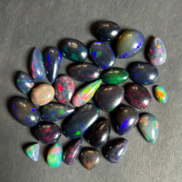 100% naturel noir éthiopien opale pierre lisse mélange pierres précieuses Cabochon en vrac AAA Grade prix d'usine en gros pour les tailles de bagues