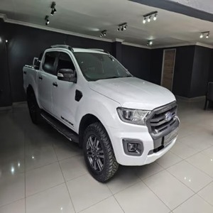 รถกระบะมือสอง ปี 2022 รุ่น Ranger Wildtrak 2.0 Bi-Turbo 4x4 เกียร์ออโต้ แบบดับเบิ้ลแค็บ เครื่องยนต์เบนซิน สำหรับขับขี่ออฟโรด รุ่น Trail Edition ยาง R18 กล้องมองหลัง 360 องศา - Product Image 1
