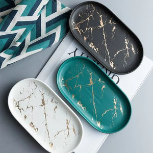 Plateaux de service modernes en céramique au design élégant, idéaux pour les cuisines et les tables à manger contemporaines - Product Image 1