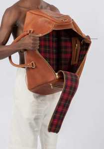 Bolsa de viaje de cuero suave de primera calidad con cierre de cremallera Cómoda y conveniente para aventuras en movimiento - Product Image 5