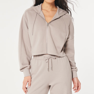 Sudaderas con capucha recortadas femeninas con logotipo personalizado al por mayor Sudadera con capucha corta de algodón para mujer Sudadera con capucha Top corto diseño OEM de talla grande más vendida - Product Image 1