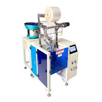 Machine de comptage et d'emballage verticale pour vis, écrous, boulons, rondelles et petites pièces de quincaillerie, pour scellage de sacs en plastique