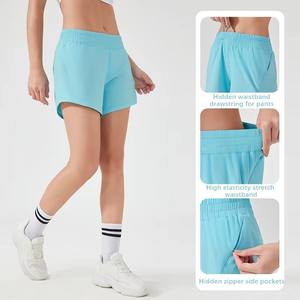Pantalones cortos de Yoga de secado rápido para mujer al por mayor, ropa deportiva de gimnasio para ciclismo con patrón sólido, pantalones cortos transpirables para mujer - Product Image 1