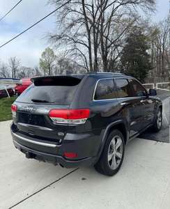 รถจี๊ปแกรนด์เชอโรกี โอเวอร์แลนด์ สปอร์ต ยูทิลิตี้ 4 ประตู ปี 2014 สภาพใหม่เอี่ยม - Product Image 4