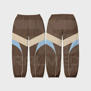 Conjunto de chaqueta y pantalón con cremallera de 3 piezas y pantalón corto Chándal cortavientos de nailon 100% Chándal a prueba de agua con hombros caídos OEM - Product Image 3