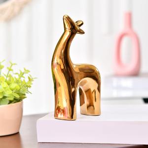 รูปปั้นกวางเรนเดียร์สีทองที่สง่างามของตกแต่งโต๊ะตามเทศกาลเหมาะสำหรับการตกแต่งบ้านการตั้งค่ากิจกรรมคริสต์มาสหรือการตกแต่งสำนักงาน - Product Image 2