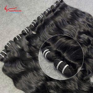 Cheveux vietnamiens bruts non transformés ondulés naturels à cuticule complète alignée extensions de cheveux humains de trame crue - Product Image 2