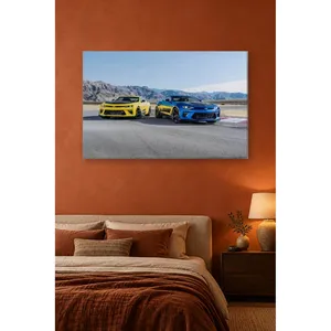 Impression sur toile Fida : Duo de Camaro jaune et bleu sur piste montagneuse - Product Image 3