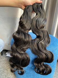 Extensiones de cabello chino tejido crudo de alta calidad profesional OEM textura ondulada del cuerpo varias longitudes fabricadas en Vietnam - Product Image 5