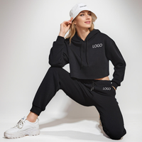 Ensemble 2 pièces de survêtements de sport personnalisés de haute qualité pour femmes, respirant, avec sweat à capuche et pantalon de jogging ample pour les entraînements d'hiver