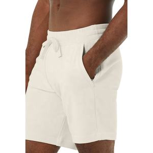 Pantalones cortos para gimnasio con logotipo personalizado de algodón y LICRA, bolsillos traseros en la cadera con cordón, cintura elástica, envío DDP - Product Image 1