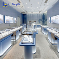 Comptoir de présentation bleu pour bijoux, design intérieur populaire pour boutique de bijoux de mode