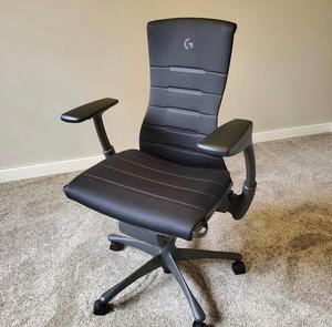 Chaise de bureau ergonomique moderne Miller X à dossier mi-haut, pivotante, pour cadre dirigeant, avec structure en acier, siège rembourré en tissu, hauteur réglable, noire - Product Image 1