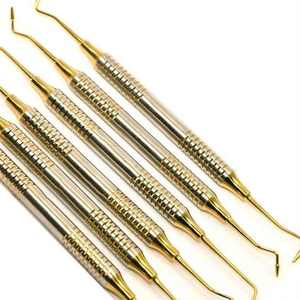 Kit de Instrumentos Dentales Manuales de Alta Calidad para Composite, Puntas Doradas, Rellenadores de Acero Inoxidable, Herramientas de Dentista de Astrin Surgical - Product Image 1