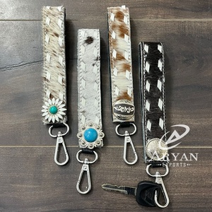 พวงกุญแจหนังวัวแท้แบบใหม่ พร้อมตัวล็อคเงินและคลิป สไตล์คาวบอยตะวันตก สำหรับผู้หญิง สายคล้องข้อมือ - Product Image 1