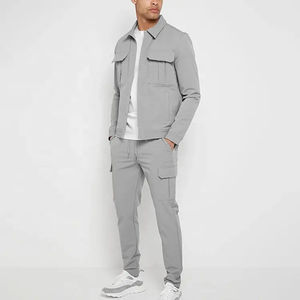 Ensemble de survêtement deux pièces en polyester pour homme, séchage rapide, respirant, coupe ajustée, OEM, pour la gym, la course à pied, le jogging, uniformes d'équipe - Product Image 1