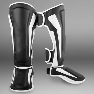 Protège-tibias en cuir noir pour la boxe, le kickboxing et le Muay Thai – Équipement de protection pour l'entraînement - Product Image 3