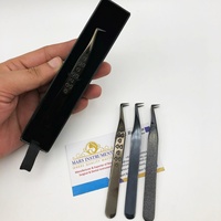 Pince à cils en acier inoxydable de style botte à 90 degrés avec pointe en fibre pointue Plasma noir pour des extensions de cils durables