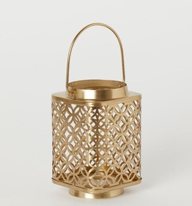 Metal votive tea light candle holder with antique style design perfect for home decor weddings parties and romantic settings - Product Image 1