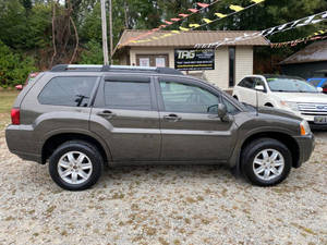 Mitsubishi Endeavor AWD LS 4dr SUV pas cher prix boîte de vitesses manuelle lumière intérieur cuir sièges R16 pneus caméra arrière Turbo gauche - Product Image 3