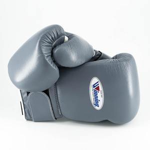 Gants de boxe d'entraînement MMA/Sanda personnalisés OEM en cuir, imperméables, protection UV, légers, avec support de poignet auto-agrippant - Product Image 1