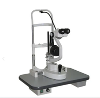 LAMPE À FENTE D'ÉCLAIRAGE OPTIQUE ÉQUIPEMENT D'OPHTALMOLOGIE MARS LAMPE À FENTE 5 ÉTAPE AVEC TABLEAU ..