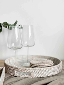 Round multi-purpose <b>storage</b> tray made of high-quality natural rattan, white in color, with handles. - Product Image 2