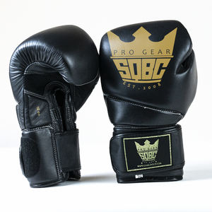 Vente en gros Gants de boxe noir et or Gants d'entraînement pour enfants Gants de MMA et de sac de boxe pour débutants - Product Image 1