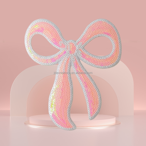 Patch thermocollant exquis rose à sequins en forme de nœud pour vêtements - Product Image 1