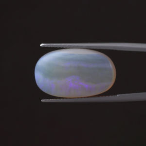 Opale naturelle blanche certifiée IGI, pierre précieuse en vrac, 15,22 carats, taille ovale, 21x13 mm, taille à la main, polie, traitement de cirage/lustrage léger - Product Image 1