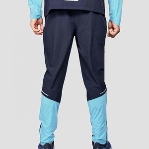 Conjunto Deportivo de 2 Piezas para Hombre, Estilo Urbano, con Capucha, Chaqueta Cortavientos con Cremallera y Pantalones Jogger con Cintura Elástica, Venta al Por Mayor OEM - Product Image 4