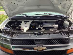 CHEVROLET EXPRESS 3500 SPORTSMOBILE 2010 D'OCCASION CÔTÉ GAUCHE/CÔTÉ DROIT - Product Image 2