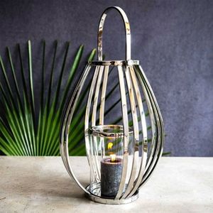 Linterna decorativa de acero inoxidable con diseño minimalista Opciones versátiles para comedores salas de estar o espacios de jardín - Product Image 4