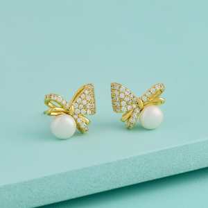 Pendientes de tuerca étnicos de moda con forma de borla, chapados en oro, de aleación de zinc, acero inoxidable, plástico, diamante, ámbar y perla, ideales para regalo de fiesta. - Product Image 1