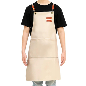 Delantales de peluquero de cuero genuino 100% para salones Delantal de salón personalizado con correas ajustables - Product Image 1