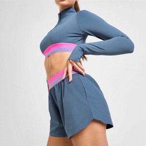 Short de sport pour femme en polyester de haute qualité, couture intérieure de 5 pouces avec poche zippée - Product Image 5
