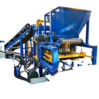 Machine à blocs de béton automatique QT4-15S pour la production en série, destinée aux usines de briques moyennes de 2000 à 8000 mètres carrés