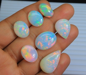 100% ópalo etíope natural cabujón galaxia Arco Iris fuego ópalo gemas enorme ópalo etíope piedra preciosa a precio mayorista - Product Image 4