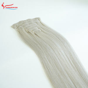 Extensions de cheveux à clips super soyeuses et blanches de qualité supérieure, fabriquées à partir de cheveux vierges vietnamiens, sans perte ni nœuds. - Product Image 1