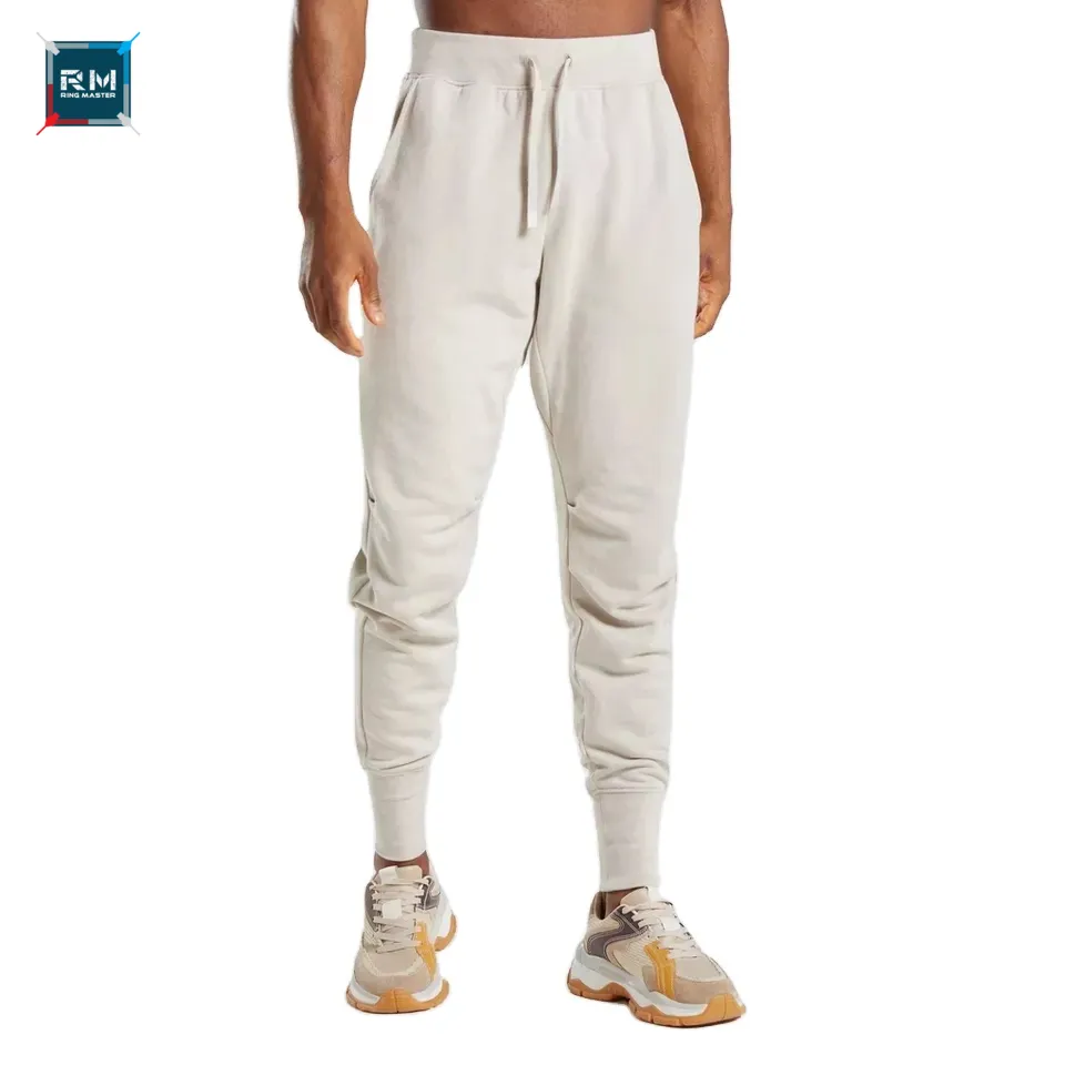 Vente en gros de pantalons de jogging de fitness vierges imprimés personnalisés vêtements de sport à séchage rapide pantalons de jogging respirants pantalons de jogging ajustés OEM