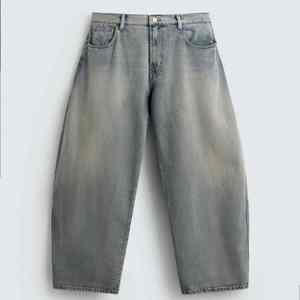 กางเกงยีนส์ทรงแบ็กกี้แบบมัดเอว ผ้ายีนส์ฟอกสีอ่อน ขากว้าง เอวสูง ข้อเข่าสองชั้น สำหรับผู้ชาย - Product Image 3