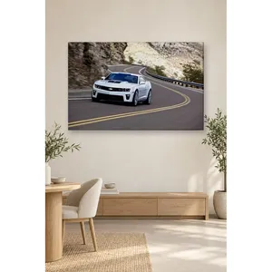 Impression sur toile : Fida White Camaro prenant une courbe de route en montagne - Product Image 2