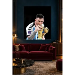 Fida Messi embrassant le trophée sur fond noir, impression sur toile - Product Image 1