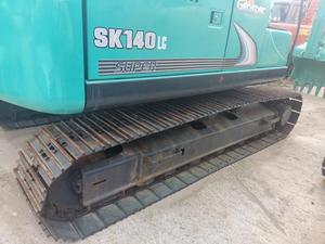 Excavatrice d'occasion Kobelco SK140 avec pour composants de base de pompe à moteur Komatsu et godet pour la fabrication de matériaux de construction 1 an - Product Image 2